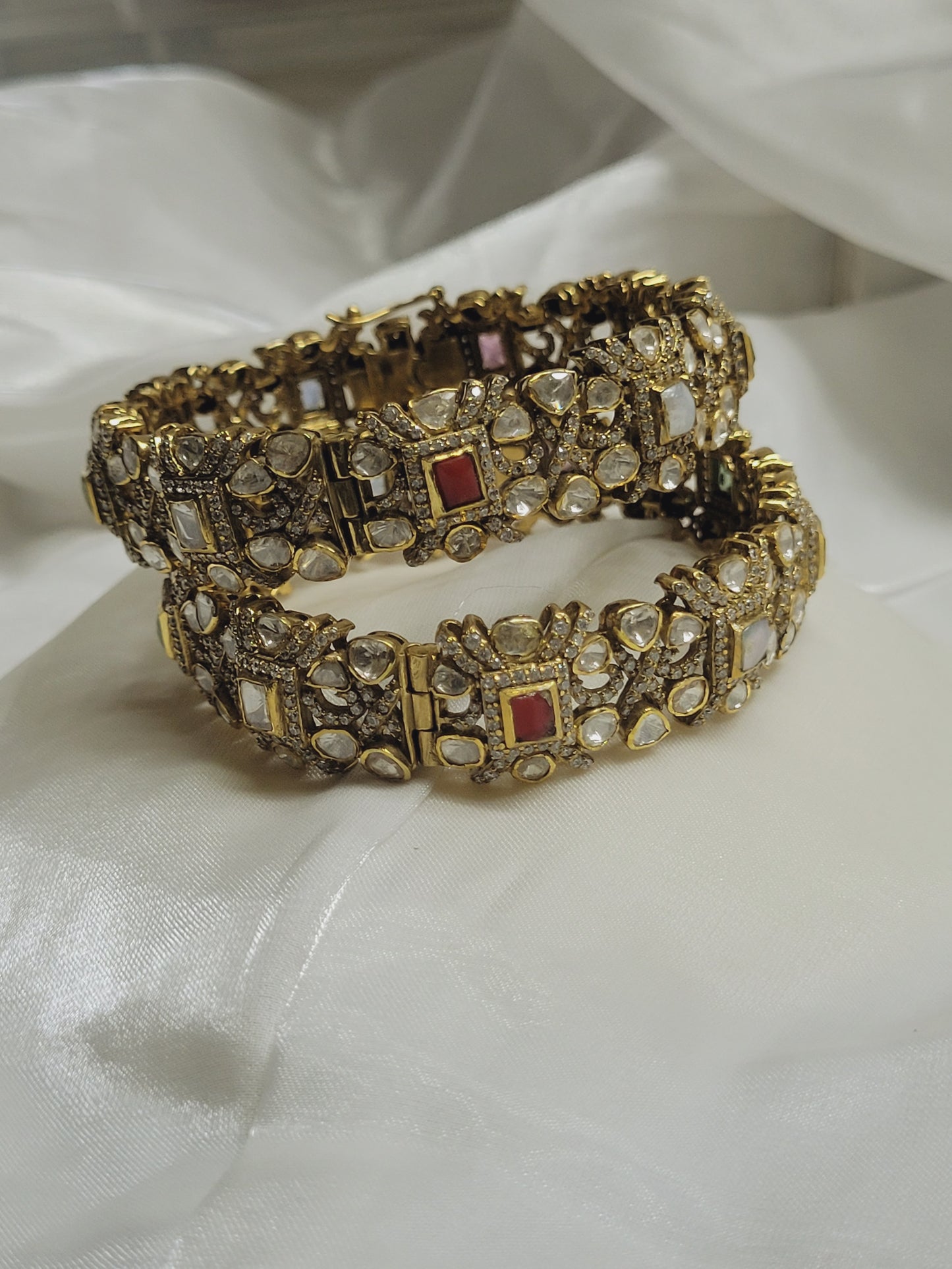 Handcrafted gold gemstone bangles, traditional Indian bridal jewellery set with detailed stone work and elegant finish