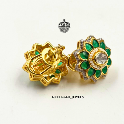 Flora shaped studs, floral stud earrings, flower earrings for women, trendy studs, lightweight earrings, daily wear earrings, designer stud earrings.