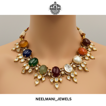Navratna bridal necklace set with multicolor gemstones, Kundan Polki design, antique gold finish.
