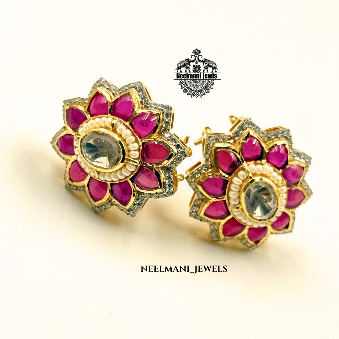 Flora shaped studs, floral stud earrings, flower earrings for women, trendy studs, lightweight earrings, daily wear earrings, designer stud earrings.