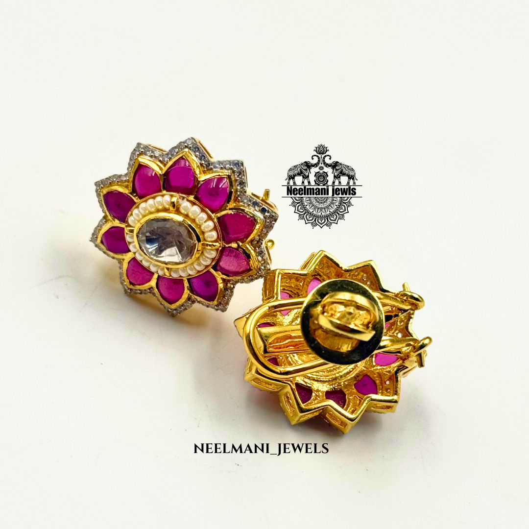 Flora shaped studs, floral stud earrings, flower earrings for women, trendy studs, lightweight earrings, daily wear earrings, designer stud earrings.