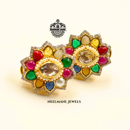 Flora shaped studs, floral stud earrings, flower earrings for women, trendy studs, lightweight earrings, daily wear earrings, designer stud earrings.