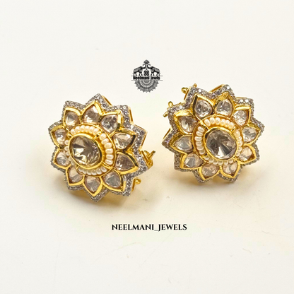 Flora shaped studs, floral stud earrings, flower earrings for women, trendy studs, lightweight earrings, daily wear earrings, designer stud earrings.